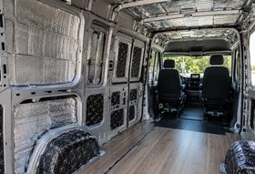Acoustic and thermal foam insulation fitted inside a car door panel